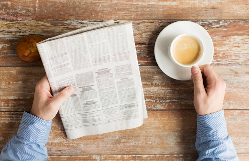 Man reading newspaper