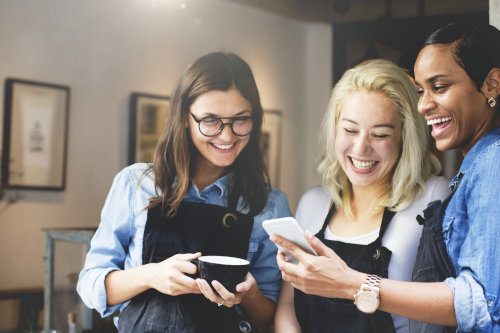 Restaurant staff working on text marketing campaign