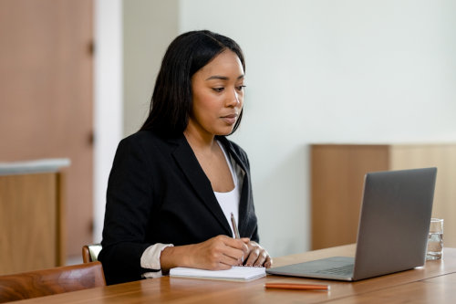 Businesswoman learning online