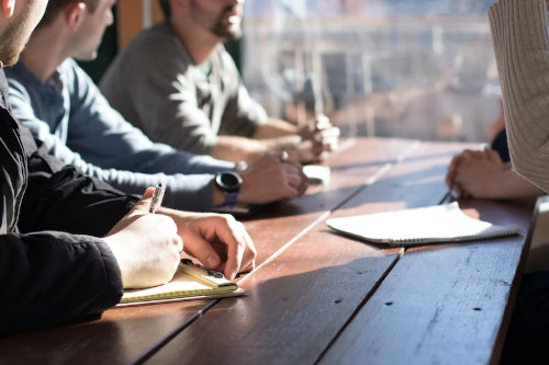 HR team discussing employee hiring process